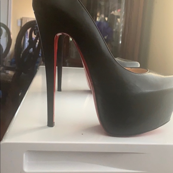 used louis vuitton red bottoms